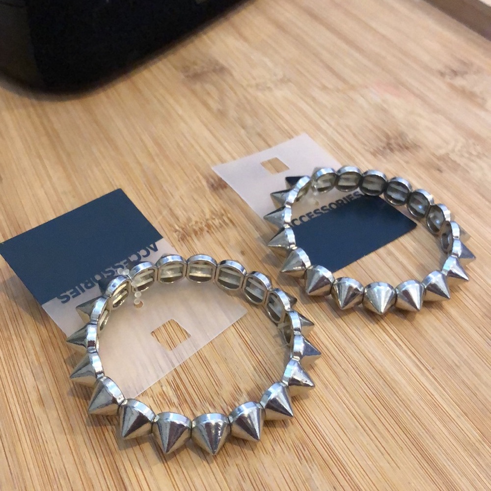 Pair of NWT spike / studded bracelets.